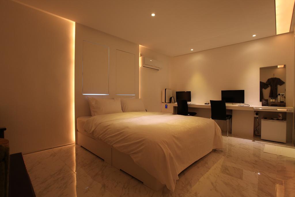 Lusso Hotel Seul Quarto foto