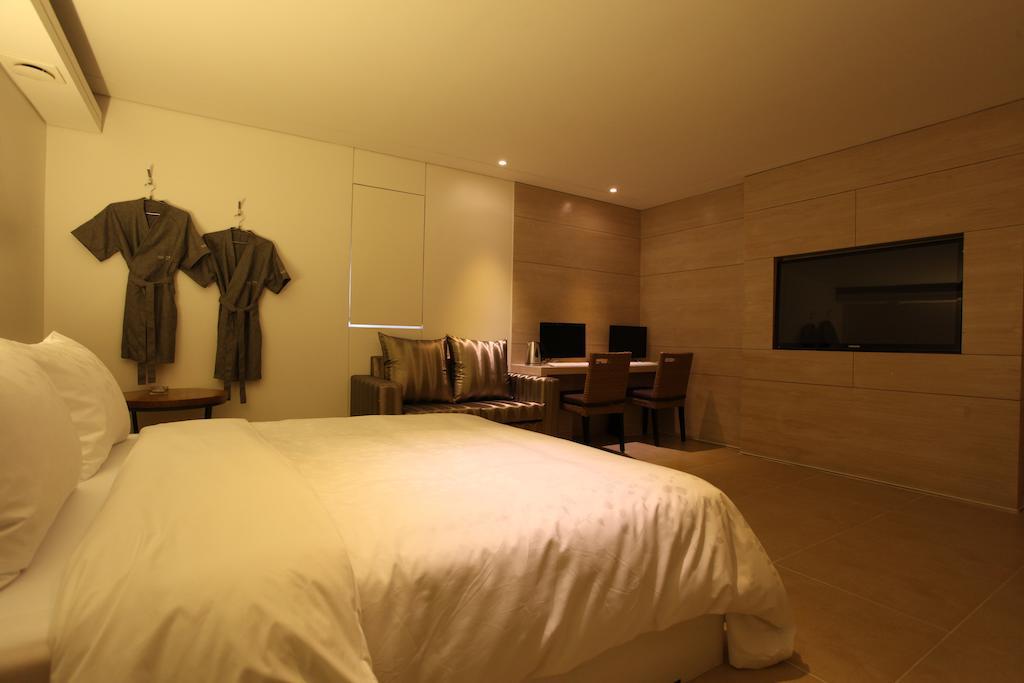 Lusso Hotel Seul Quarto foto