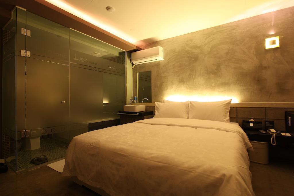 Lusso Hotel Seul Quarto foto